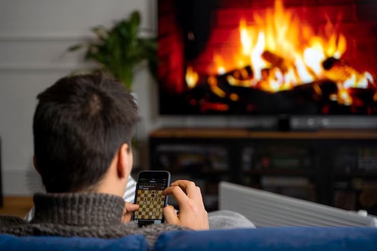 Living room with a fireplace on a winter evening